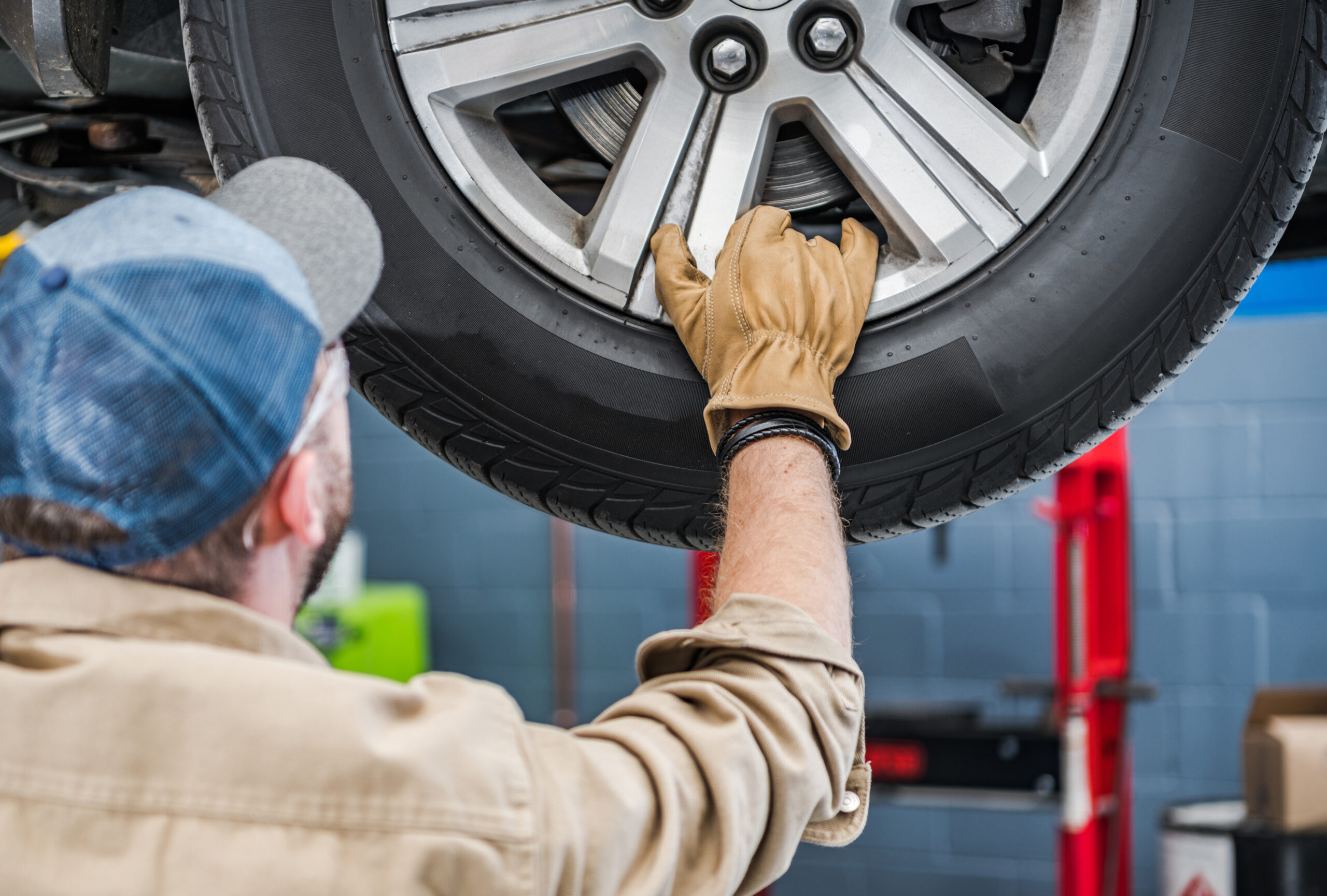 Auto Service Worker is About to Change Brake Discs and Braking P